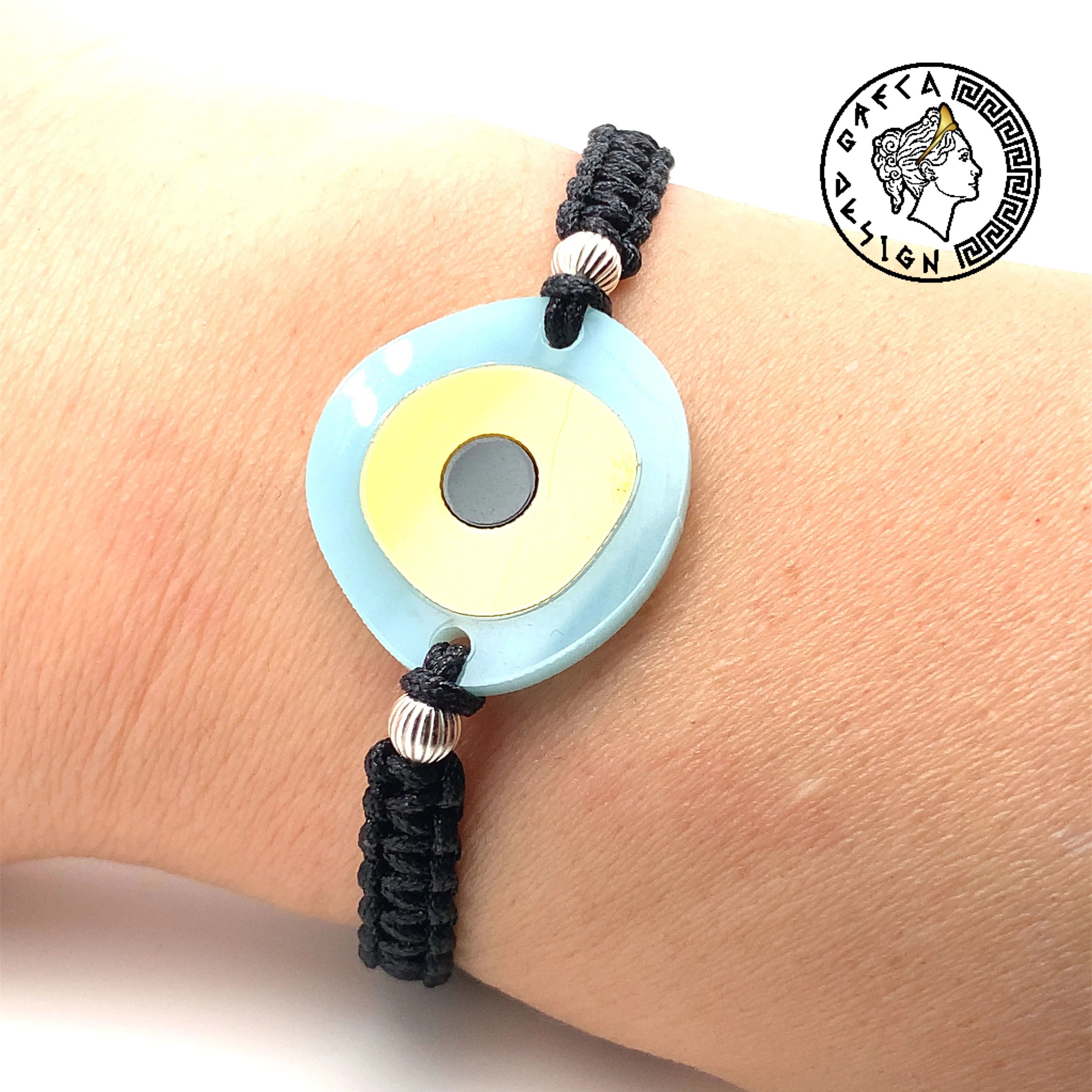 Greca Design Armband Auge – Hellblau & Goldbraun Unikat
