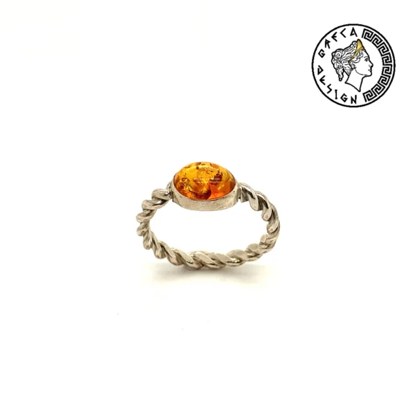 Greca Design Ring mit Bernstein
